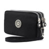 Black solid color women's wallet with wrist strap