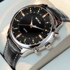 Black dial quartz watch with leather strap