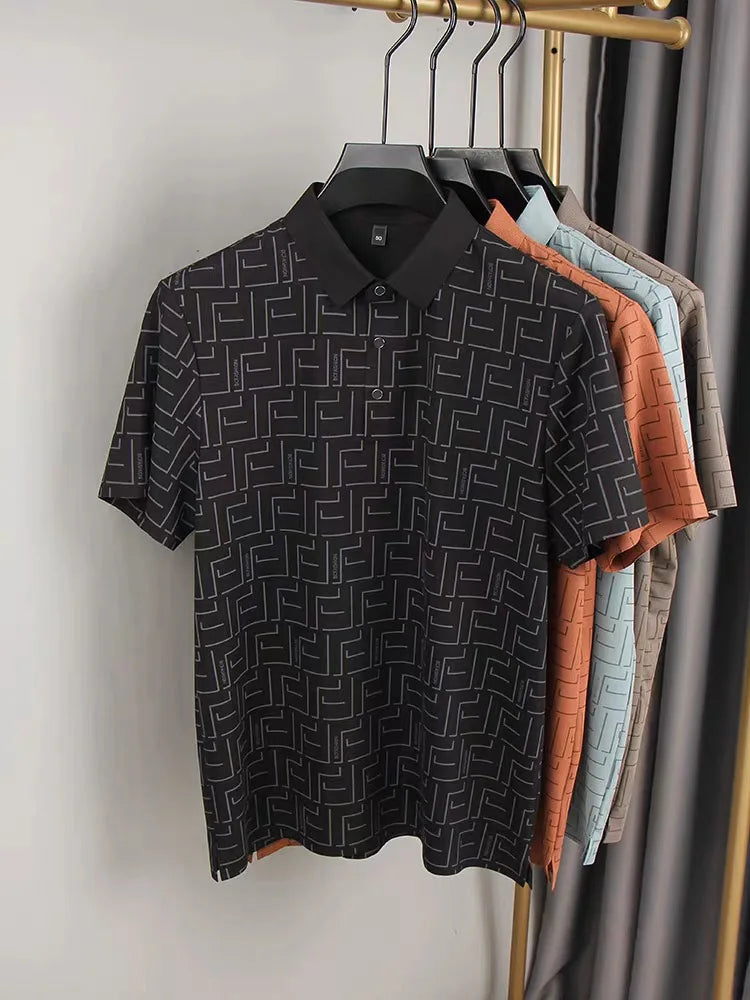 Black silk t-shirt for men with geometric pattern displayed on a rack.