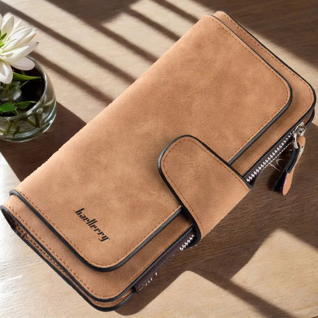 Brown women's long trifold wallet with soft texture and multiple compartments, ideal for everyday use and travel.