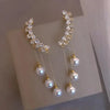 Crystal and pearl dangle earrings with multiple strands