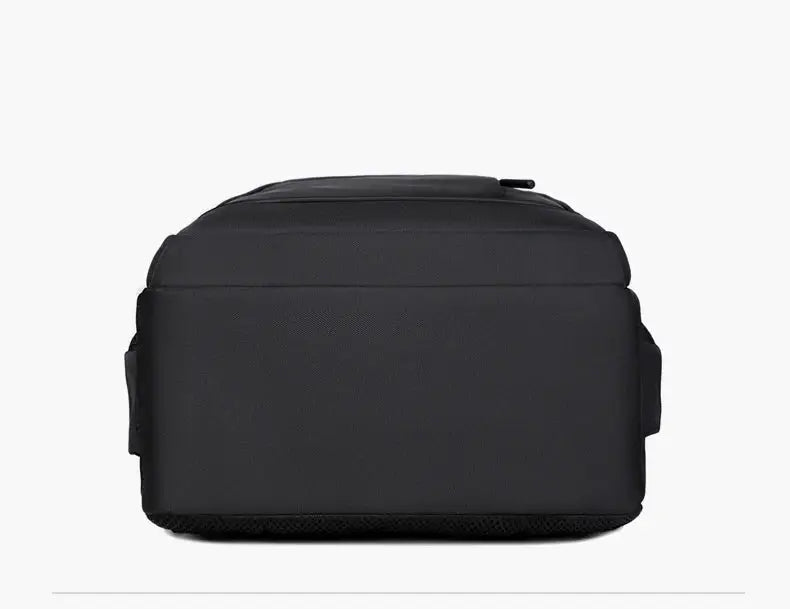 Bottom view of men’s waterproof Oxford backpack showing durable base, suitable for daily commuting, school, or travel.