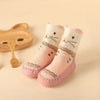 Pink rabbit baby shoes with floral design