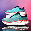 Teal men's running shoes with white and red sole