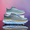 Gray men's running shoes with blue and yellow sole