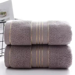 Gray thick cotton absorbent towels, ultra-soft and quick-drying.