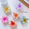 Matte flower hair clips in muted colors