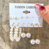 Pearl earring set with gold accents and studs