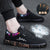 Black graffiti canvas shoes with vibrant accents