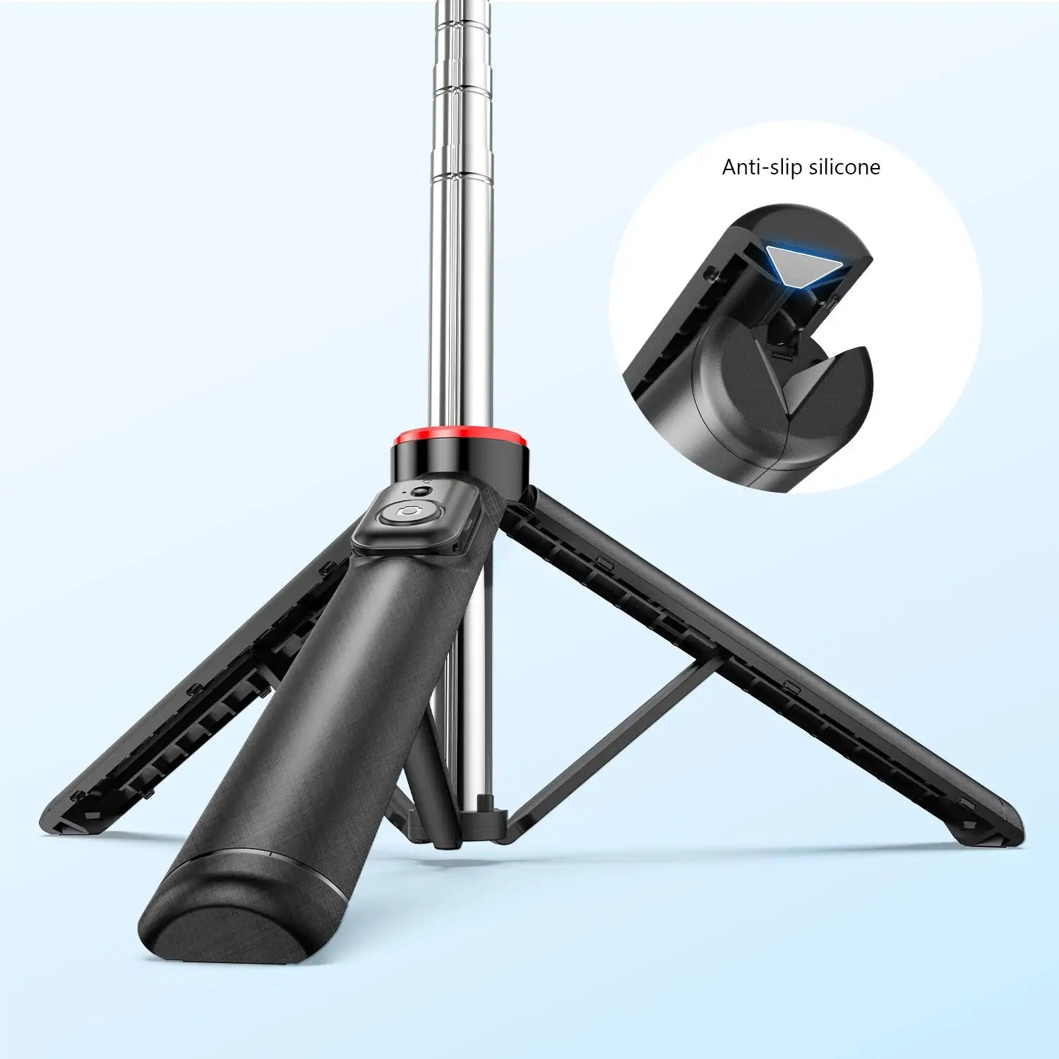 Close-up of Bluetooth Selfie Stick Tripod base showing anti-slip silicone feet for enhanced stability on various surfaces during use.