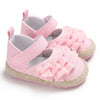 Pink baby sandals with ruffle design