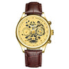 Gold luxury watch with brown leather strap