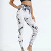 White and black patterned women's sports leggings