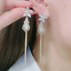 Elegant crystal flower tassel earrings with long chains