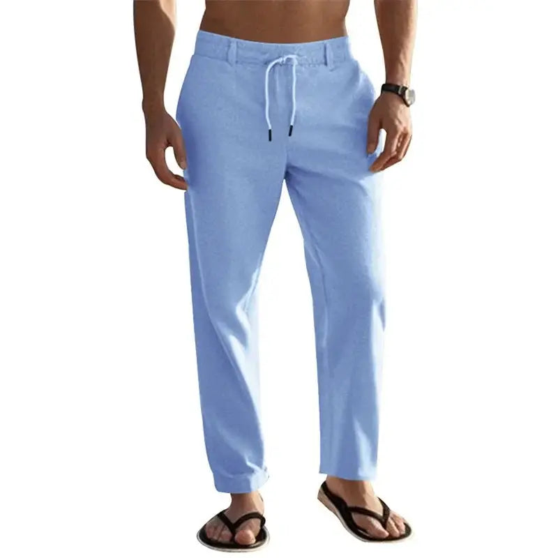 Men's lightweight linen pants in light blue with drawstring waist and straight-leg fit, ideal for beach and casual summer wear.