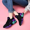 Black women's sneakers with purple and teal accents