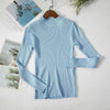 Light blue women's turtleneck sweater on hanger