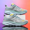 Gray men's marathon running shoes with yellow accents