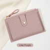 Minimalist short wallet in lilac purple on white surface