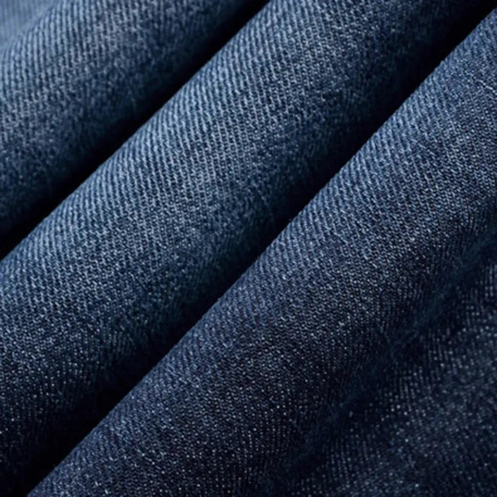 Fabric close-up of men’s stretch denim jeans showing soft, durable weave ideal for skateboarding and daily wear.