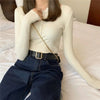 Cream knitted women sweater with button decoration.