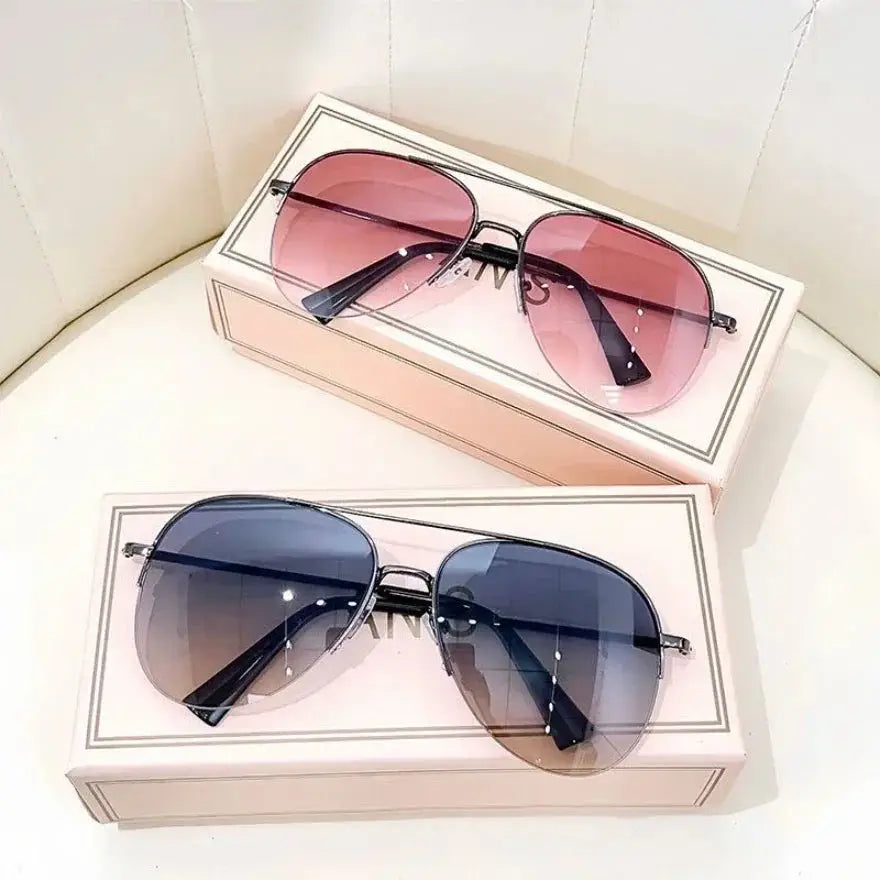 Fashionable polarized UV400 sunglasses with pink and blue gradient lenses. Designed for men & women for driving and outdoor use.