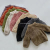 Colorful winter coats for children in various shades