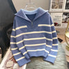 Striped blue and white women's pullover sweater with zipper