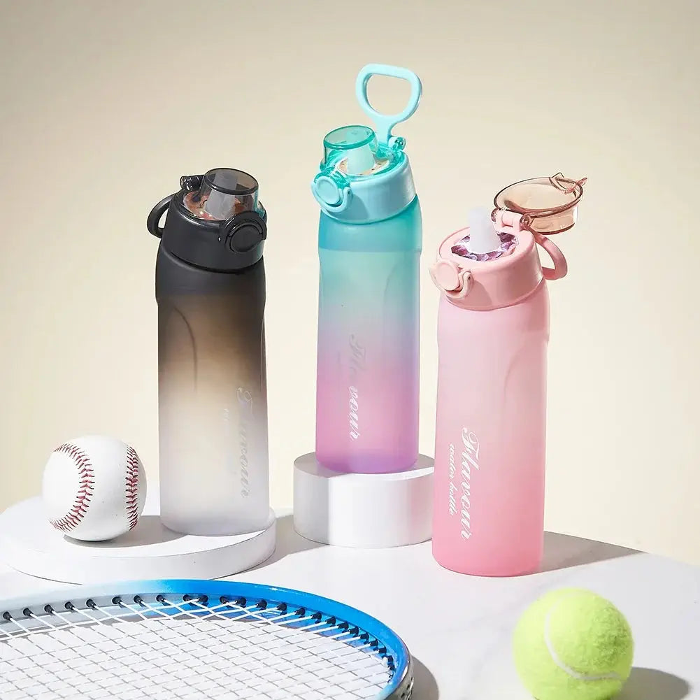 Three 750ml flavored water bottles with scent pods placed beside sports gear, perfect for gym, tennis, and baseball hydration needs.