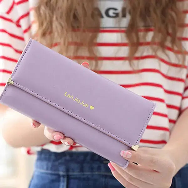 Lavender Women's Long PU Leather Trifold Wallet with gold heart clasp, combining fashion and functionality for daily wear.