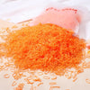 Orange elastic hair bands scattered