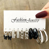 Silver and black earring set with geometric designs