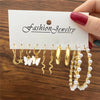 Gold earring set with stars and pearls