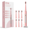 Pink sonic electric toothbrush set with packaging.