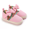 Pink baby shoes with rainbow lining