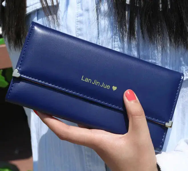 Navy blue Women's Long PU Leather Trifold Wallet with sleek finish and gold logo, perfect for stylish everyday organization.