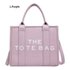 Light purple tote bag with stylish text design