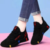 Black women's vulcanized shoes with colorful accents