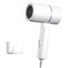 White mini foldable hair dryer with attachment