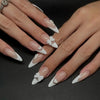 White almond nails with bow and heart designs