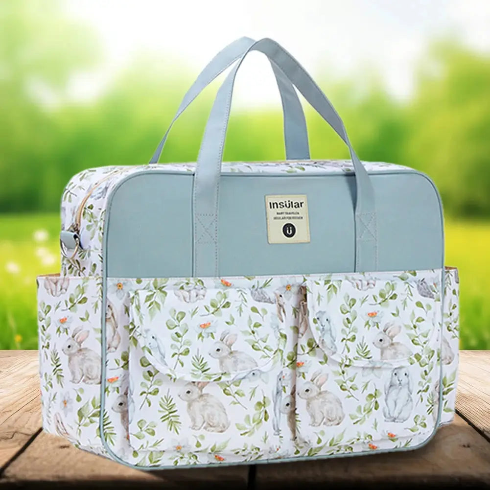 Waterproof maternity stroller bag with large capacity, lightweight shoulder design, ideal for travel and daily use