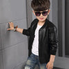 Trendy black leather coat for kids, perfect for winter.