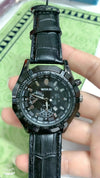 Black leather strap watch with tachymeter