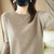 Beige women's round neck sweater