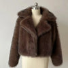 Dark brown luxury fur coat on mannequin