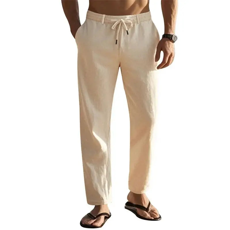 Men's lightweight linen pants with drawstring and pockets in beige, featuring a straight-leg fit ideal for beach and casual summer wear.