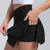 Black pleated sports skirt showing built-in shorts