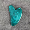 Teal gua sha massage tool