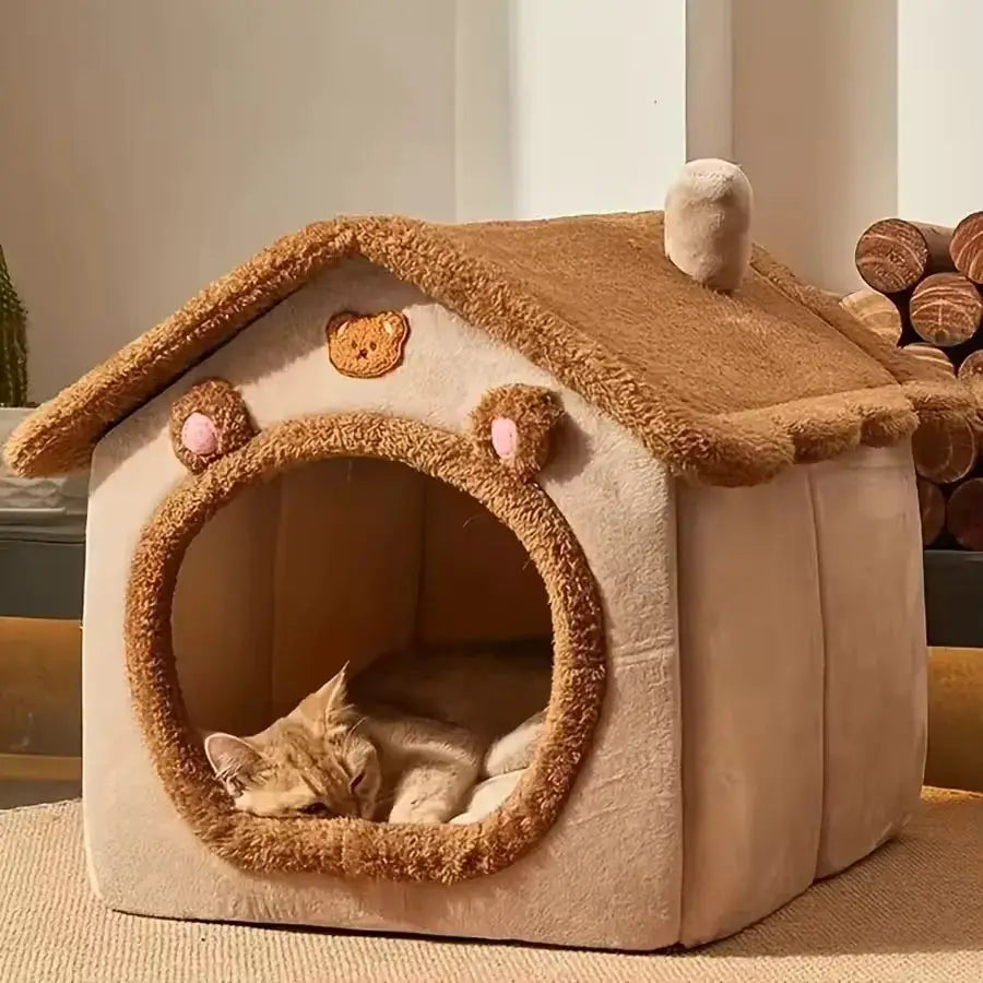 Foldable pet bed house for small dogs and cats with cave-style sofa design, cozy fleece material, cat sleeping inside