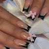 Glossy black French nails with pink bows